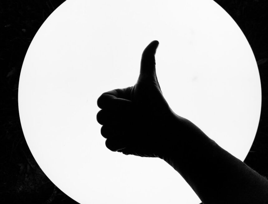 Photo by Jan Antonin Kolar persons hand on white round board