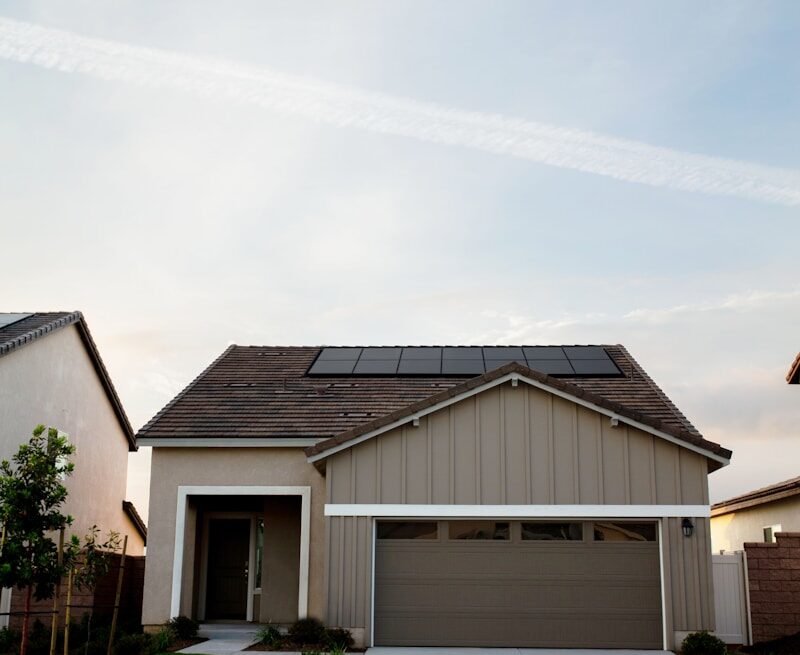 Photo by Vivint Solar white and brown building during daytime